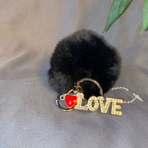 NWOT fuzzy bag metal charm/ keychain that reads: ♥️LOVE.